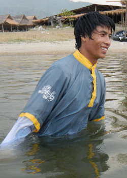 beach anorak grey swimming in lake